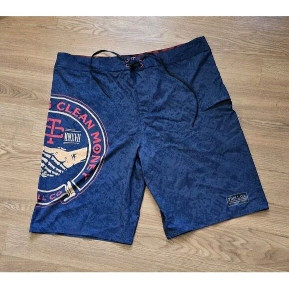 Troll Co. Haggler Boardshort Dirty Hands Clean Money Size 38 Blue Multi 10" Ins. - Picture 1 of 7